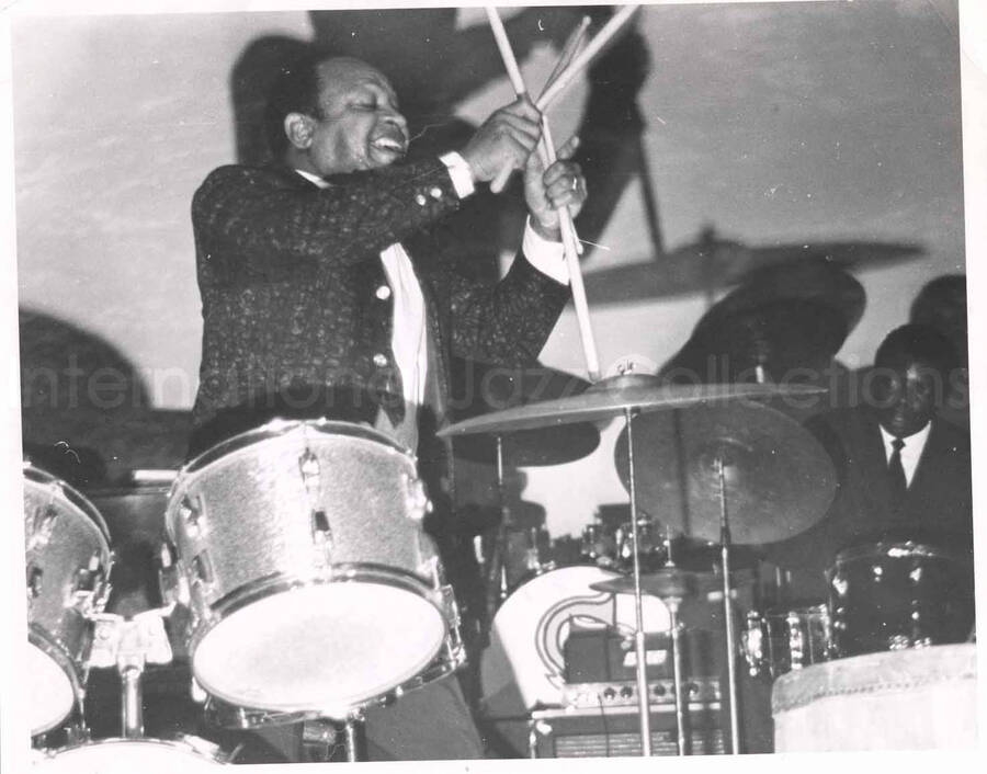 7 x 9 1/2 inch photograph. Lionel Hampton playing the drums