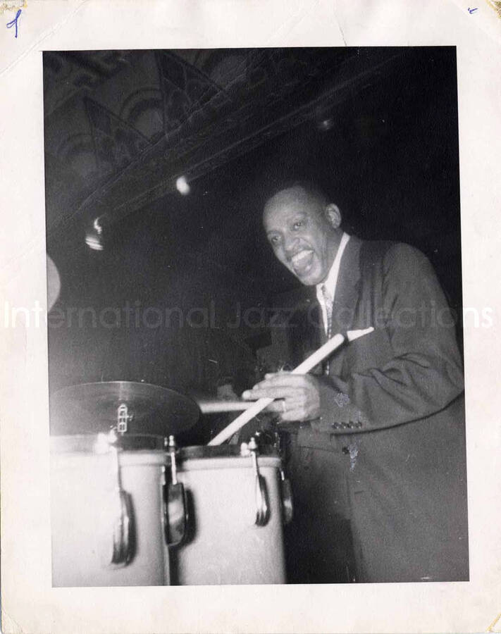 10 x 8 inch photograph. Lionel Hampton playing the drums at the Colonial Tavern, in Toronto, Canada. This photograph is dedicated to Lionel Hampton from [??] Padbury from Hamilton, Ontario