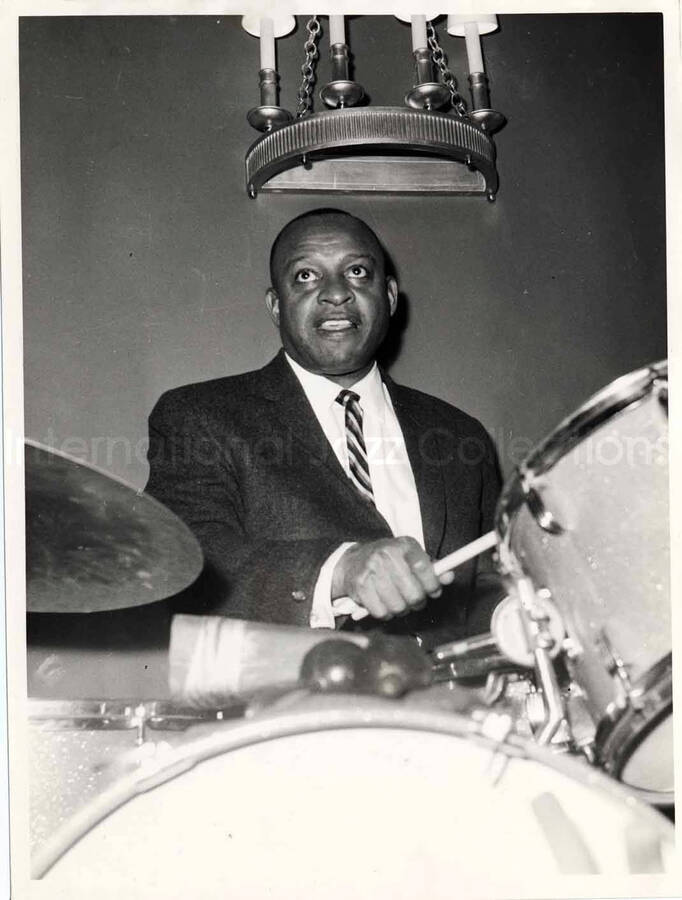 7 1/2 x 9 1/2 inch photograph. Lionel Hampton playing the drums. [Rome, Italy]