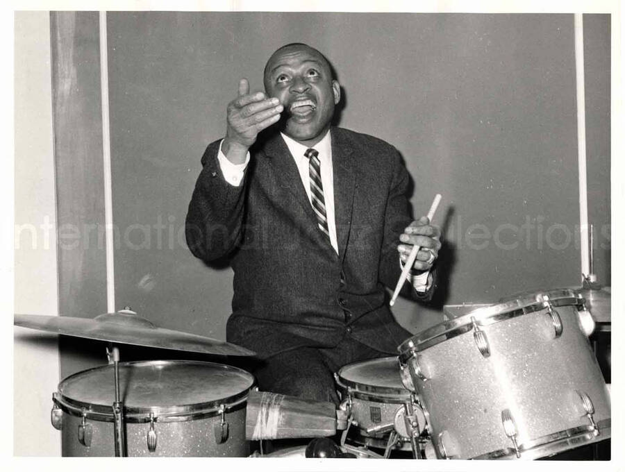 7 1/2 x 9 1/2 inch photograph. Lionel Hampton playing the drums. [Rome, Italy]