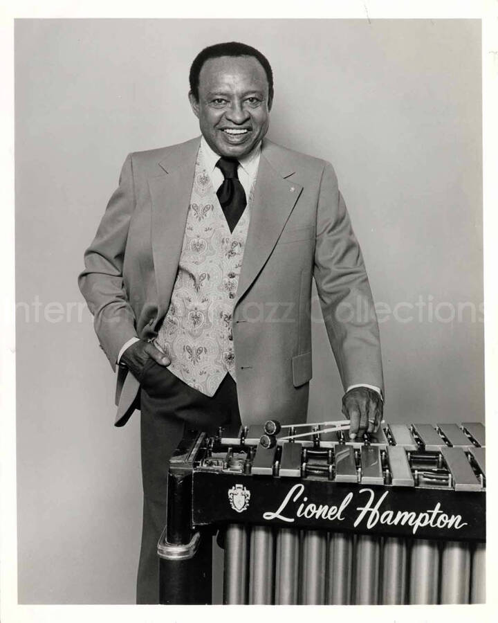 8 x 10 inch photograph. Lionel Hampton posing at the vibraphone