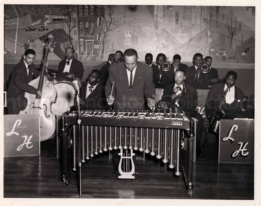 8 x 10 inch photograph. Lionel Hampton performing with his orchestra