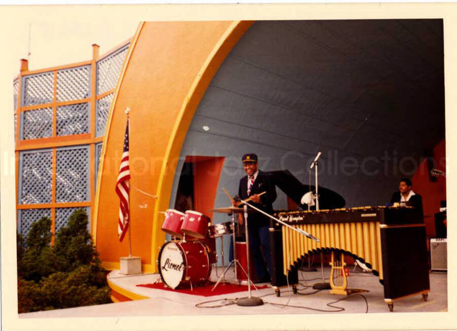 3 1/2 x 5 inch photograph. Lionel Hampton and band at an outdoor concert