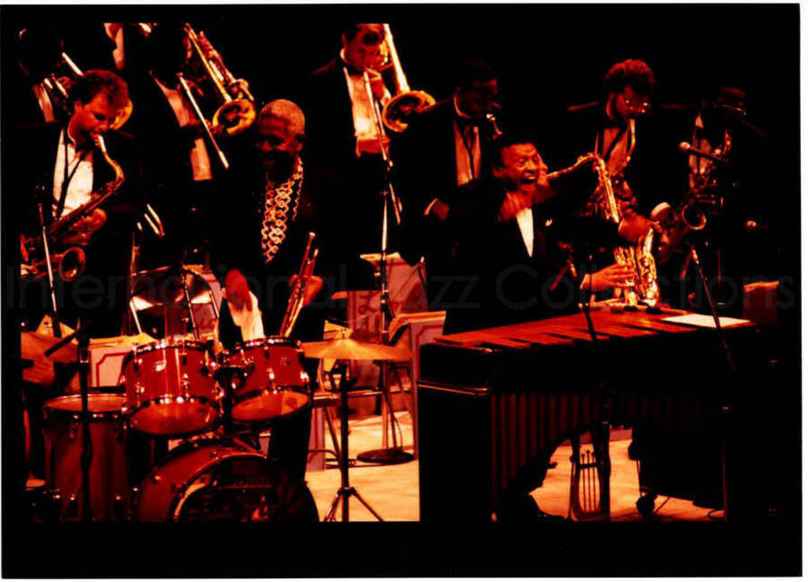 5 x 7 inch photograph. Lionel Hampton on the vibraphone with band and Dizzy Gillespie