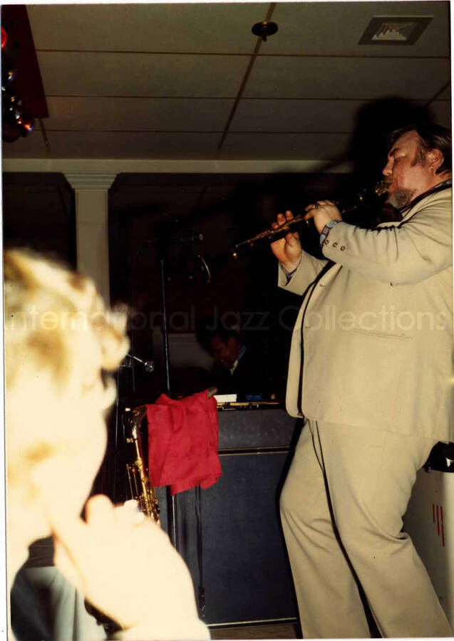 5 x 3 1/2 inch photograph. Lionel Hampton on vibraphone with unidentified clarinetist