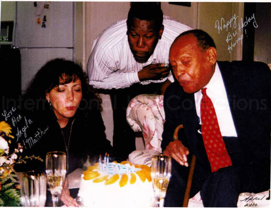 8  x 10 inch photograph. Lionel Hampton with Angela DeNiro and Ruben on his 92nd birthday. This photograph is dedicated to Lionel Hampton from Ron, Angela, and Mathew. This is a photocopy of a photograph print