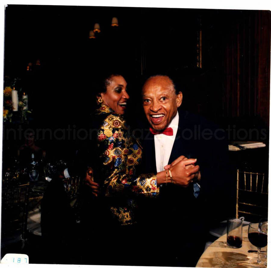 5 x 5 inch photograph. Lionel Hampton with unidentified woman