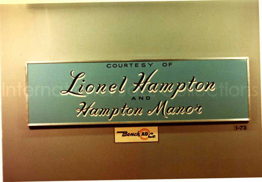 3 1/2 x 5 inch photograph. A plaque on a wall with the inscription: Courtesy of Lionel Hampton and Hampton Manor