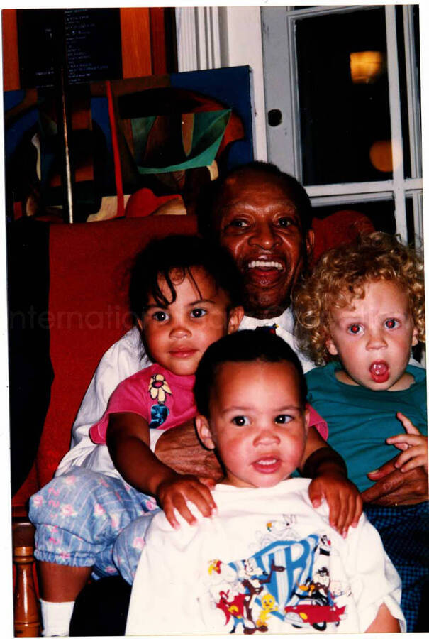 6 x 4 inch photograph. Lionel Hampton with children