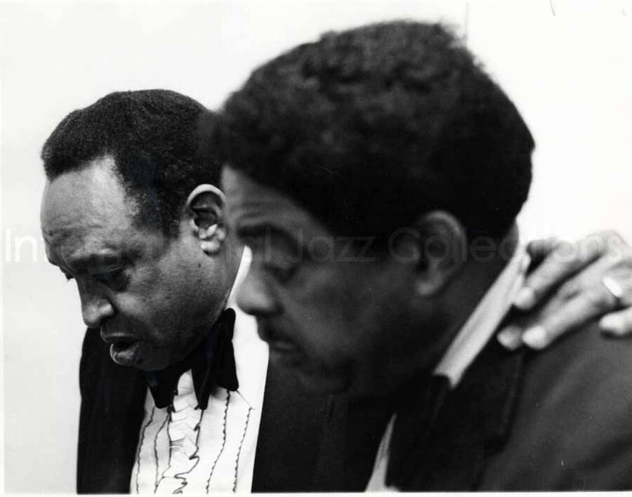 8 x 10 inch photograph. Lionel Hampton and Wild Bill Davis playing the piano
