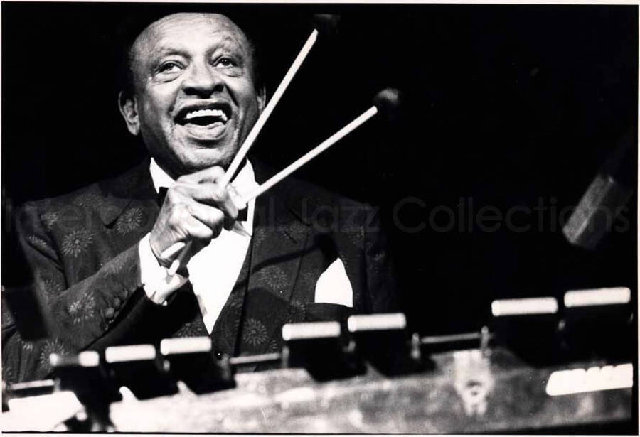 7 x 9 1/2 inch photograph. Lionel Hampton playing the vibraphone [in Italy]