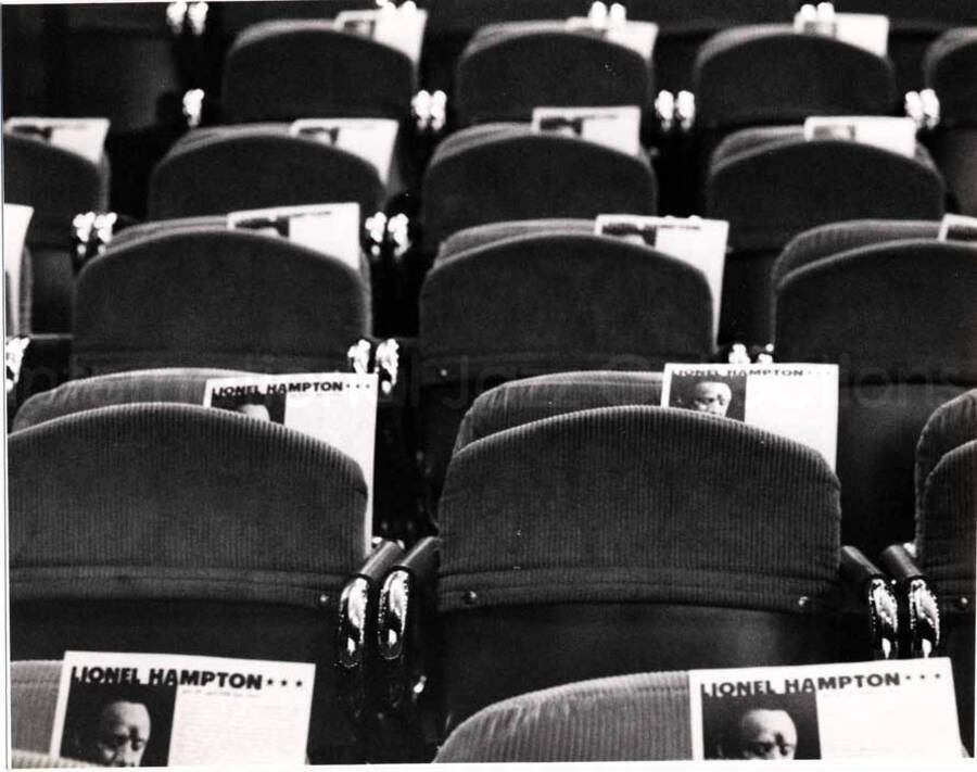4 x 5 inch photograph. Audience seats with Lionel Hampton place holders