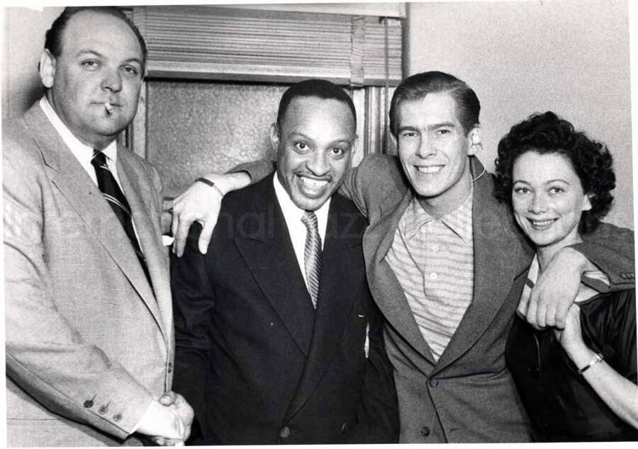 8 x 10 inch photograph. Lionel Hampton with Billy May and unidentified man and woman
