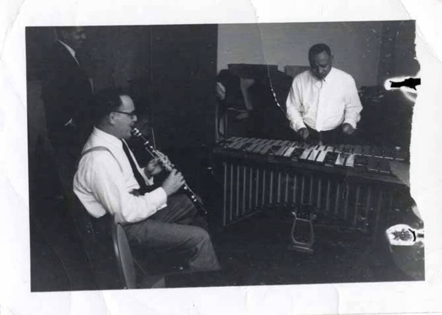 3 1/2 x 4 1/2 inch photograph. Lionel Hampton on vibraphone with [Benny Goodman] on clarinet