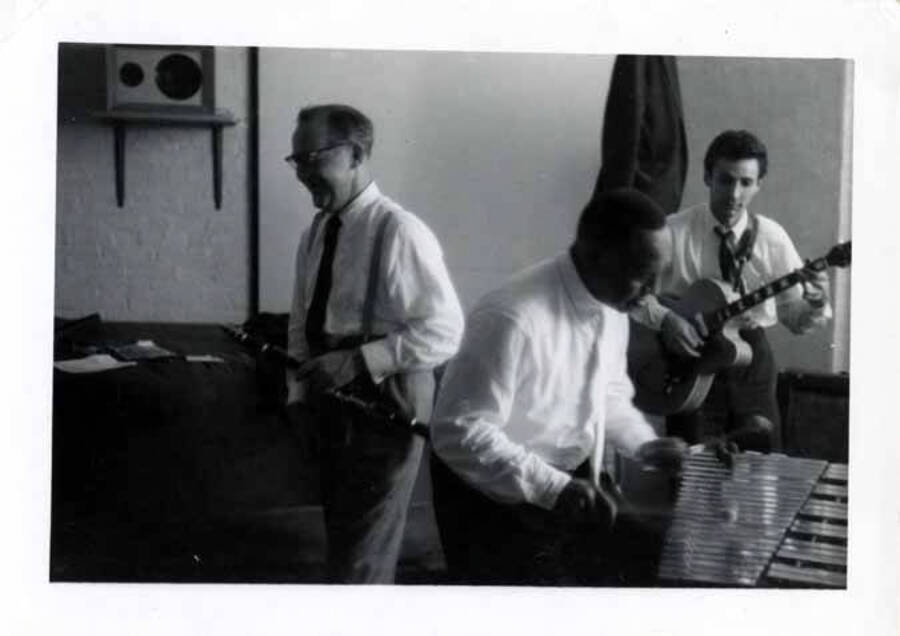 3 1/2 x 4 1/2 inch photograph. Lionel Hampton on vibraphone with [Benny Goodman] on clarinet and unidentified guitarist