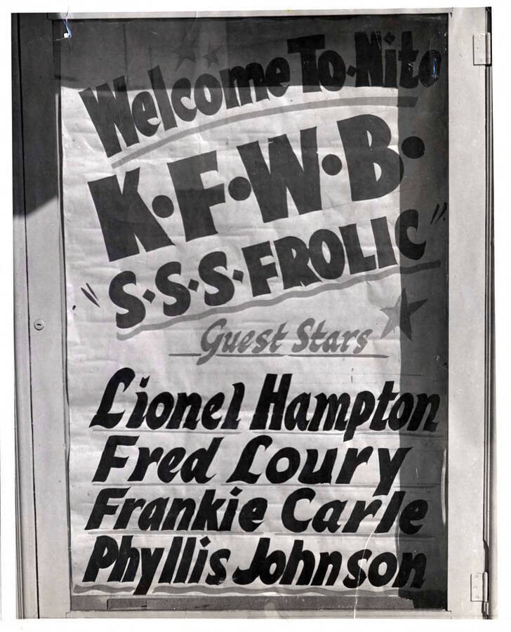 10 x 8 inch photograph. A poster that reads: Welcome To-Nite; K.F.W.B.; SSS Frolic; Guest stars Lionel Hampton, Fred Loury, Frankie Carle, Phyllis Johnson