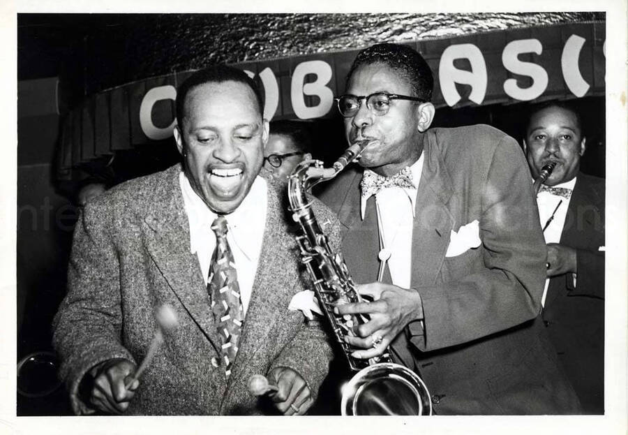 5 x 7 inch photograph. Lionel Hampton and Johnny Board. Bobby Plater is in the background.