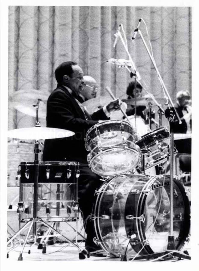 6 x 4 inch photograph. Lionel Hampton playing the drums