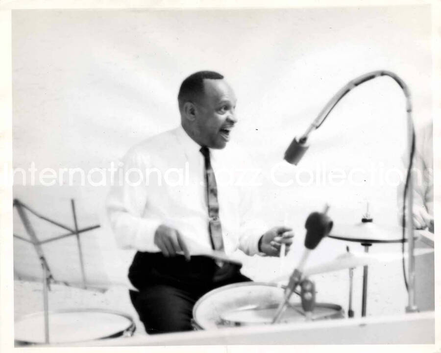 8 x 10 inch photograph. Lionel Hampton playing the drums