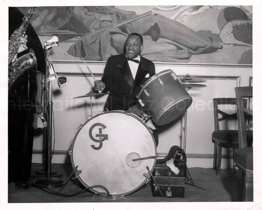 8 x 10 inch photograph. Lionel Hampton playing the drums. Initials inscribed on the drums: GJ [or] JG