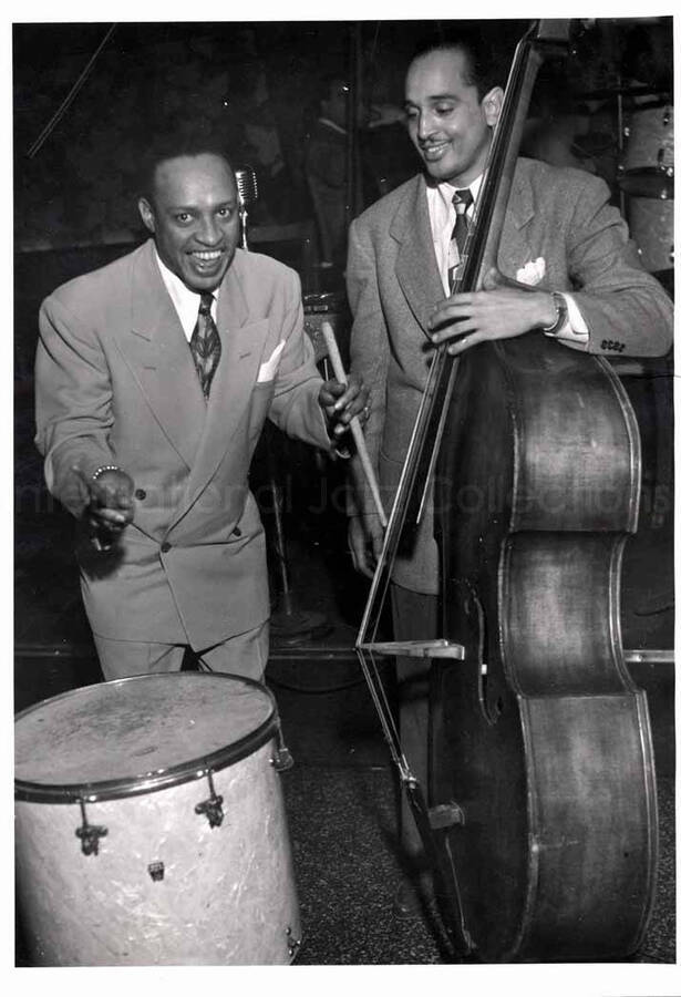 7 x 5 inch photograph. Lionel Hampton playing the drums with  bassist Charles Harris