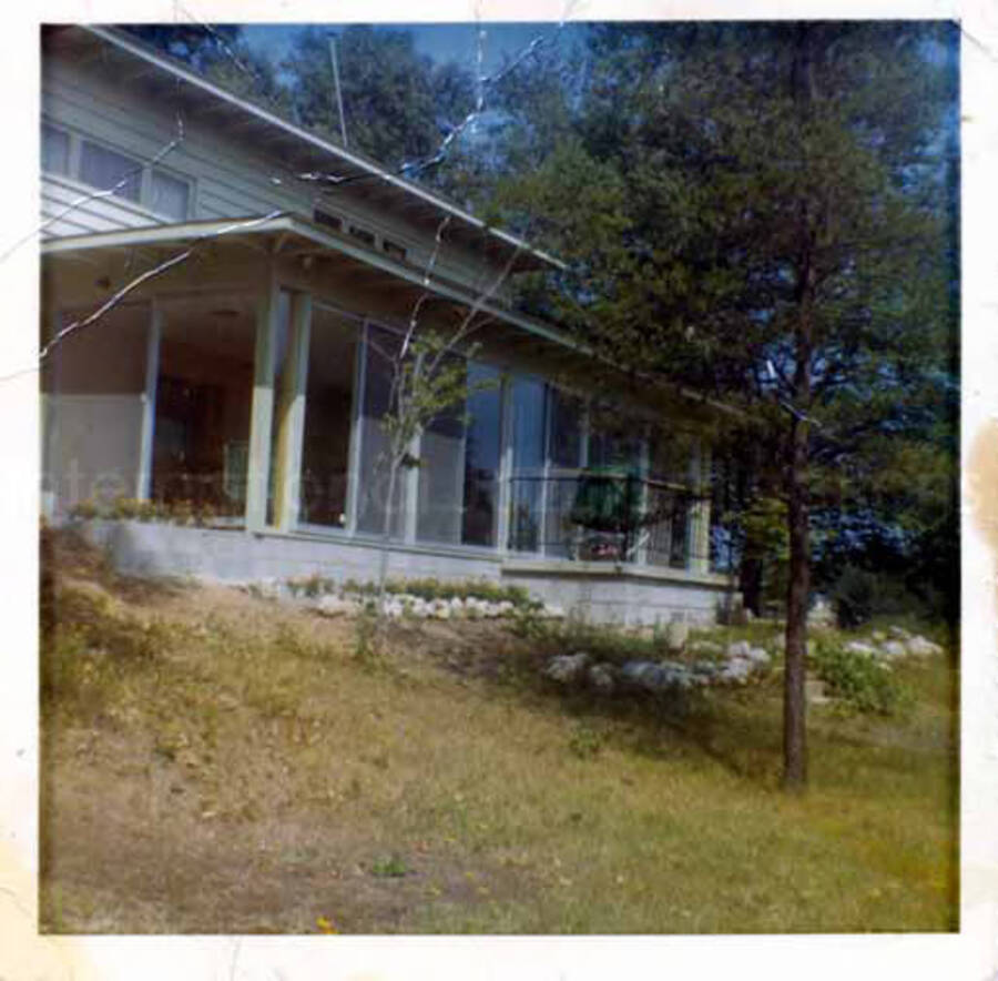 3 1/2 x 3 1/2 inch photograph. View of the back of a house