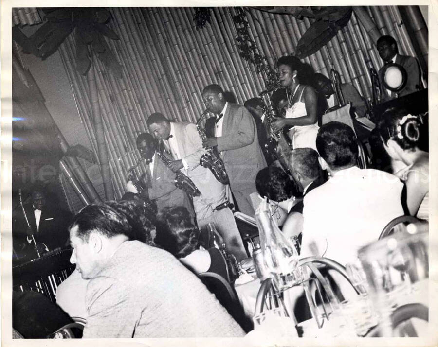 8 x 10 inch photograph. Lionel Hampton at the vibraphone with band which includes guitarist Billy Mackel