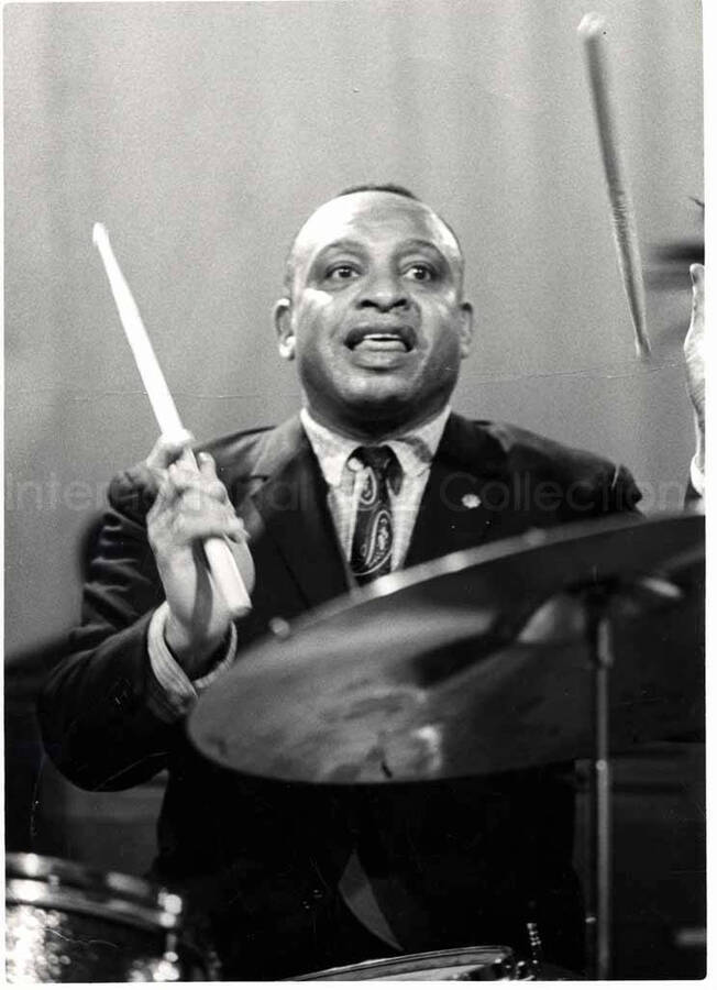 7 x 5 inch photograph. Lionel Hampton playing the drums