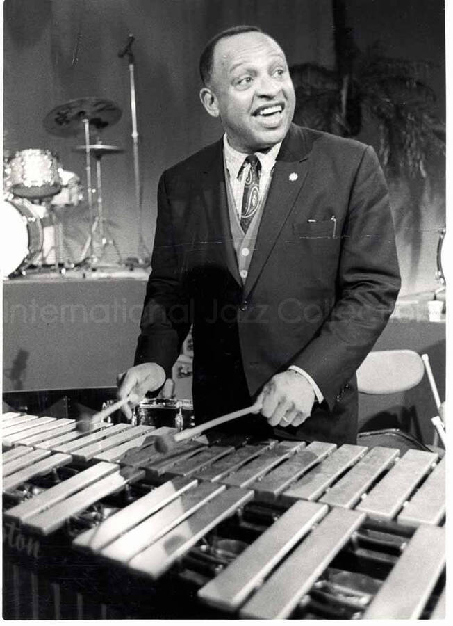7 x 5 inch photograph. Lionel Hampton playing the vibraphone