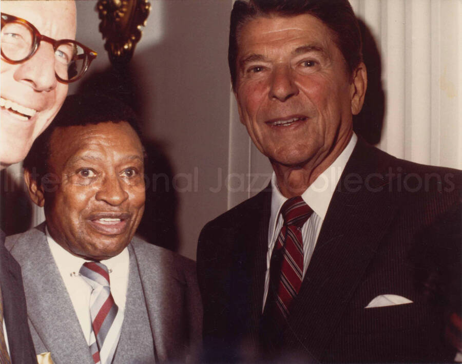 8 x 10 inch photograph. Lionel Hampton with President Ronald Reagan and unidentified man probably inside the White House on the occasion of the concert on January 27, 1981