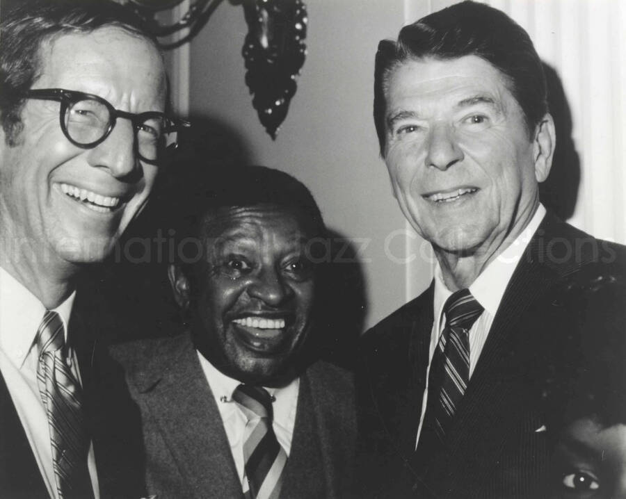 8 x 10 inch photograph. Lionel Hampton with President Ronald Reagan and unidentified man probably inside the White House on the occasion of the concert on January 27, 1981