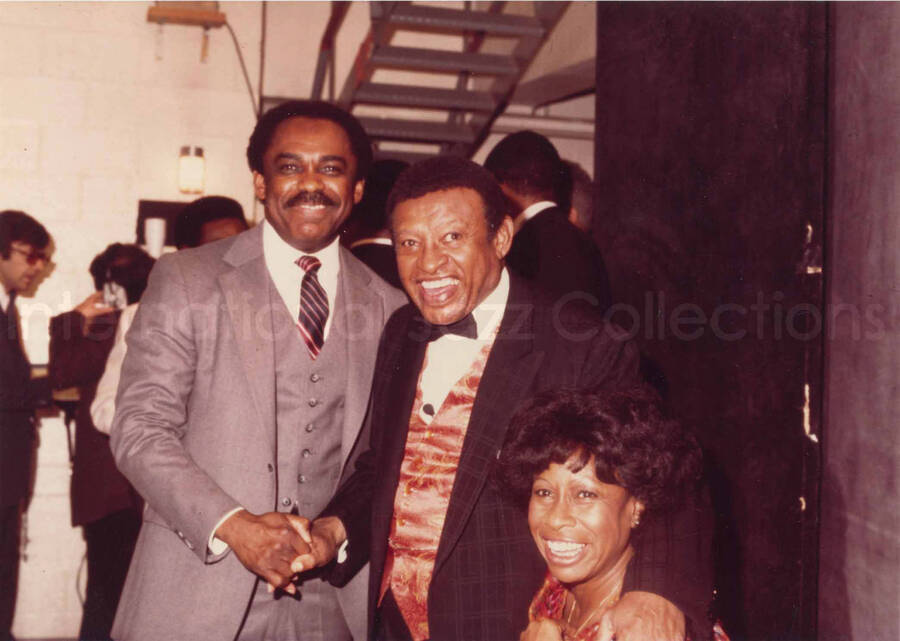 5 x 7 inch photograph. Lionel Hampton with Betty Carter and unidentified man