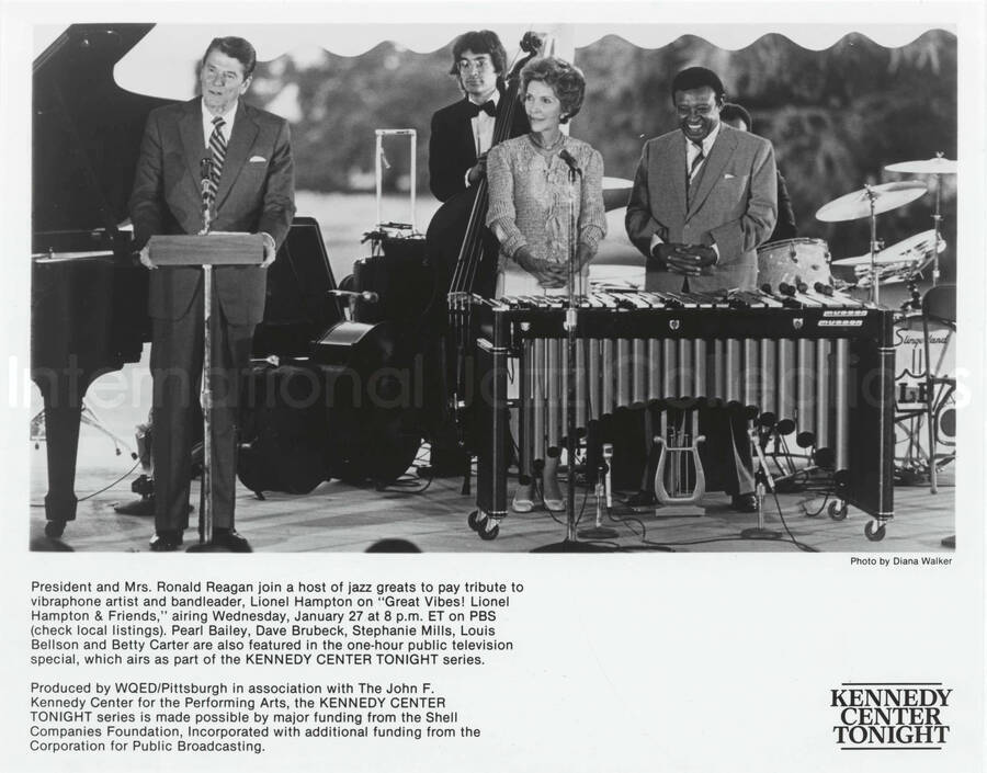 8 x 10 inch promotional photograph. Lionel Hampton with President and Mrs. Ronald Reagan in an outdoor stage at the White House. This concert was aired January 27, 1982 on the public television special, Great Vibes! Lionel Hampton and Friends, as part of the Kennedy Center Tonight series