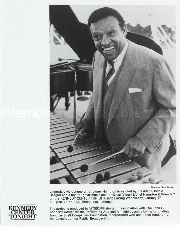 10 x 8 inch promotional photograph. Lionel Hampton playing the vibraphone in an outdoor concert at the White House. This concert was aired January 27, 1982 on the public television special, Great Vibes! Lionel Hampton and Friends, as part of the Kennedy Center Tonight series