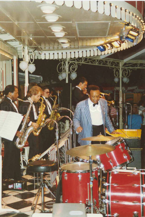5 x 3 1/2 inch photograph. Lionel Hampton performing on the drums with band [at Disneyland]