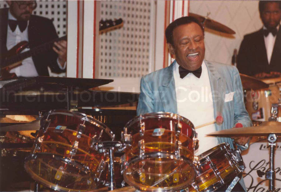 3 1/2 x 5 inch photograph. Lionel Hampton playing the drums [at Disneyland]