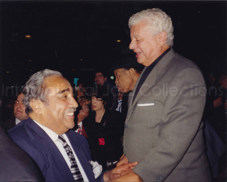 8 x 10 inch photograph. Charles Bernard Rangel and Tito Puente. Lionel Hampton's 90th birthday at the Blue Note in New York