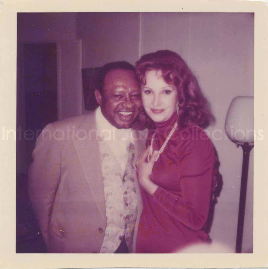 3 1/2 x 3 1/2 inch photograph. Lionel Hampton with photojournalist Gilda Morigi