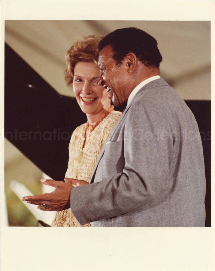 10 x 8 inch photograph. Lionel Hampton with First Lady Nancy Davis Reagan at an outdoor concert at the White House. This concert was aired January 27, 1982 on the public television special, Great Vibes! Lionel Hampton and Friends, as part of the Kennedy Center Tonight series