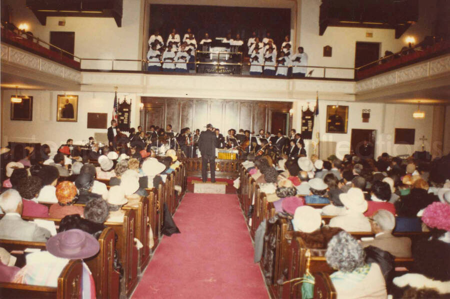 4 x 6 inch photograph. Ceremony on the occasion of Lionel Hampton receiving a plaque from the Mother African Methodist Episcopal Zion Church. Label on the back of the photograph reads: D. P. A. Syndicate, New York, NY