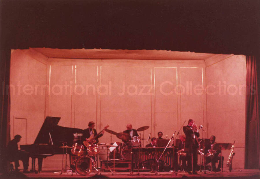 5 x 7 inch photograph. Lionel Hampton with band. Handwritten on the back of the photograph: Teatro El Circulo, Rosario, Argentina; Lionel Hampton All Stars; Glenn Drewes soloing. This photograph has a dedication from Wis Contijoch and Ruben Gonzalez