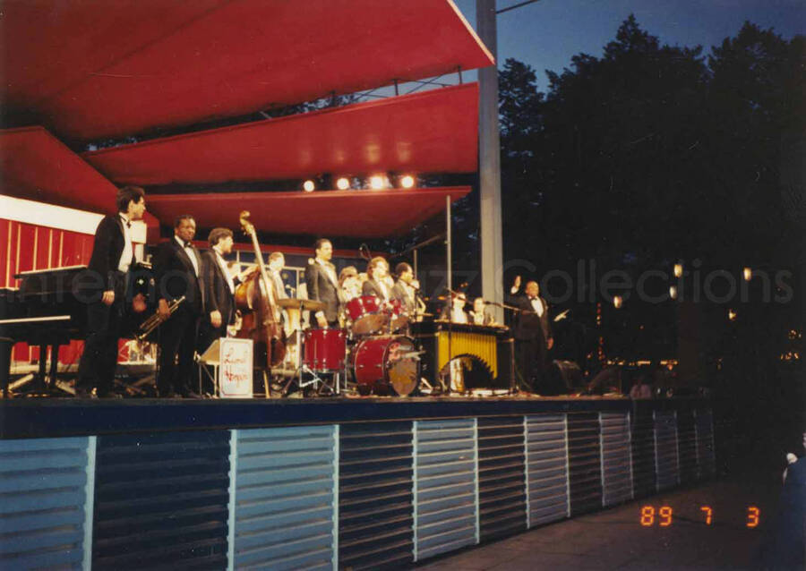 3 1/2 x 5 inch photograph. Lionel Hampton and band at an outdoor concert