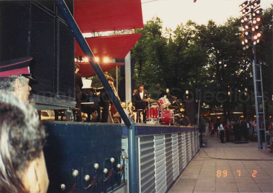 3 1/2 x 5 inch photograph. Lionel Hampton and band at an outdoor concert