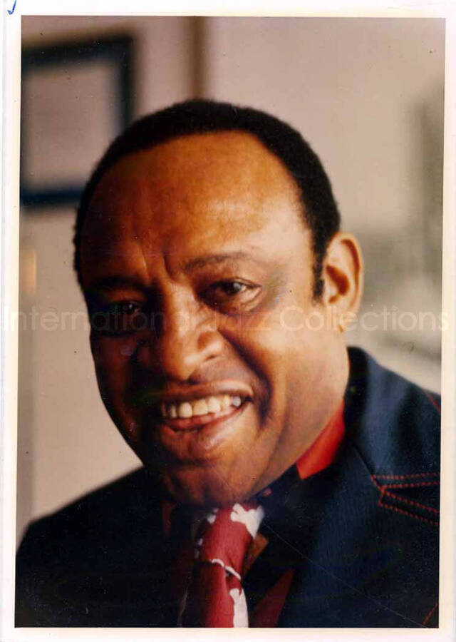 7 x 5 inch photograph. Portrait of Lionel Hampton inside a portfolio