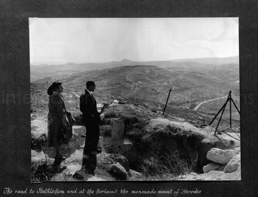 8 x 10 inch photograph. Lionel Hampton in Israel. This photograph is in a photo album titled: In the Holy City - Jerusalem. Caption under the photograph reads: The road to Bethlehem and at the horizont the men made mount of Herodes