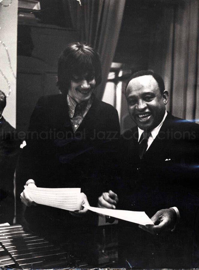 15 1/2 x 12 inch photograph. Lionel Hampton with unidentified man [in San Remo, Italy?]