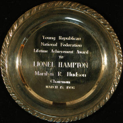 Tray. 7 3/4" Silver Oneida engraved tray Young Republican National Federation Lifetime Achievement Award presented to Lionel Hampton. Marilyn R. Hudson, Chairman. Mar. 15, 1986
