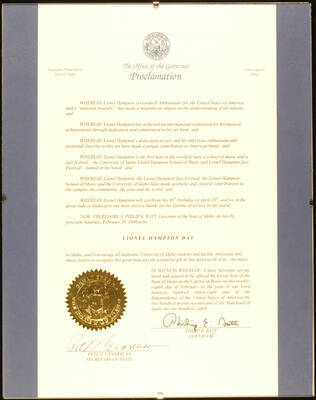 Framed Certificate. 14"x11" Frame holding a proclamation with gold foil seal on blue background under glass State of Idaho proclaims February 28, 1998 as Lionel Hampton Day. Philip E. Batt, Governor and Pete T. Cenarrusa, Secretary of State. Boise, ID, Feb. 28,1998