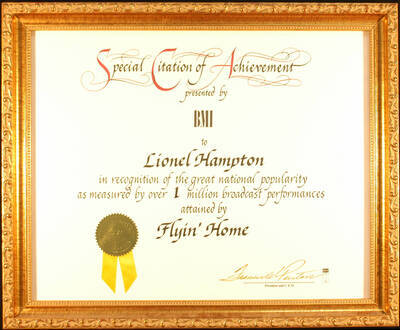 Framed Certificate. 14"x17 Frame holding a certificate with gold foil seal and yellow ribbon under glass Special Citation of Achievement presented to Lionel Hampton by Broadcast Music, Inc-BMI for the popularity attained by Flyin' Home. Frances W. Preston, President and C.E.O.