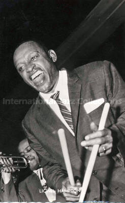5 1/2 x 3 1/2 inch photograph in the format of postcard. Lionel Hampton [in Belgium]
